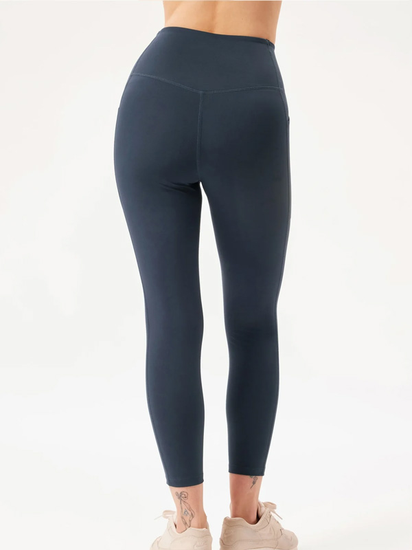 POCKET - Plus Size Treenitightsit fra Girlfriend Collective
